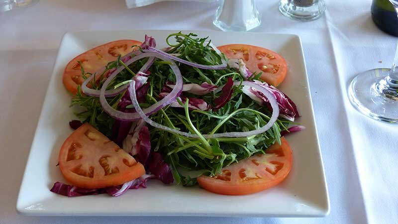 Arugula salad with fresh tomatoes